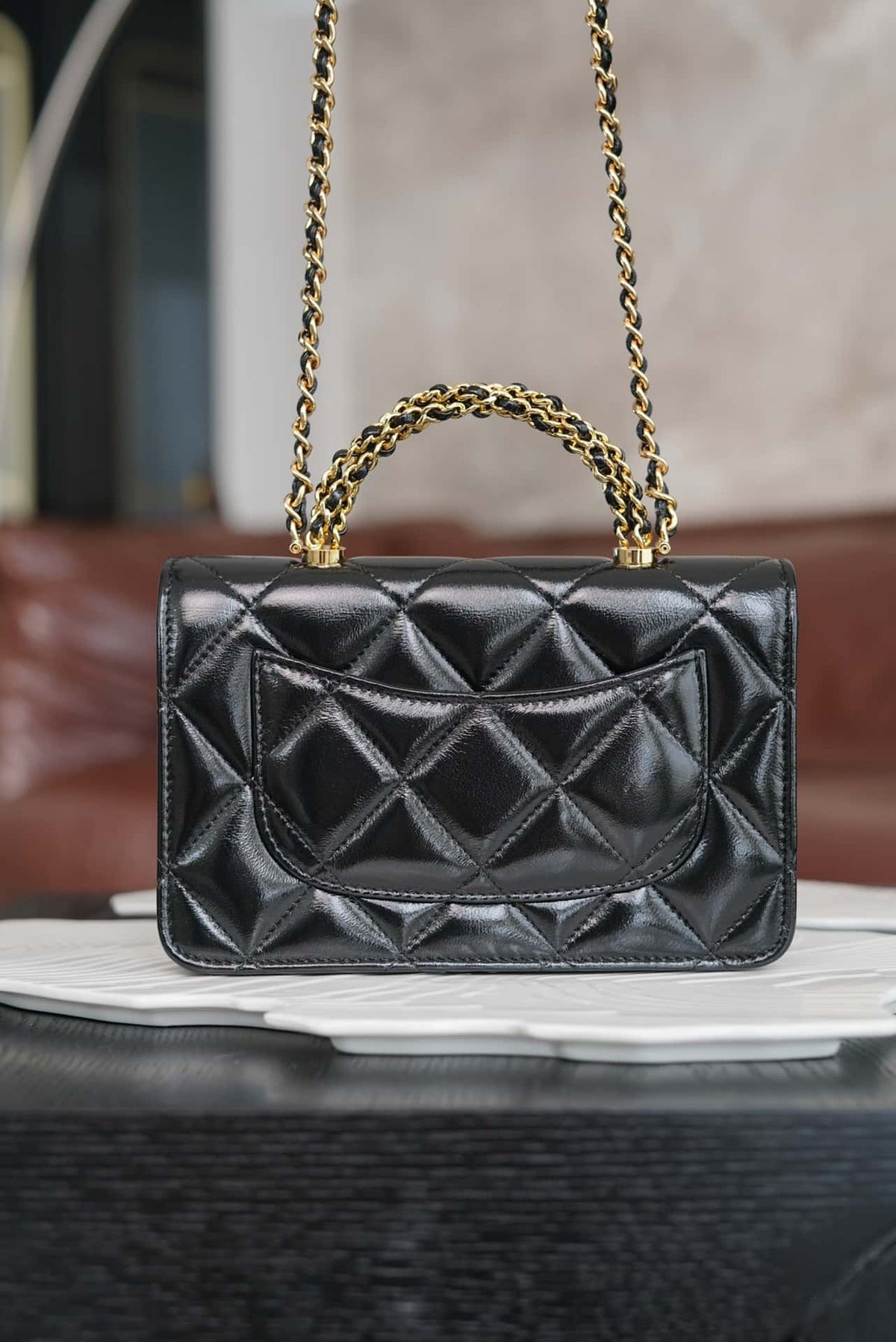 Chanel 24B WOC Top Handle in Black Shiny Lambskin GHW